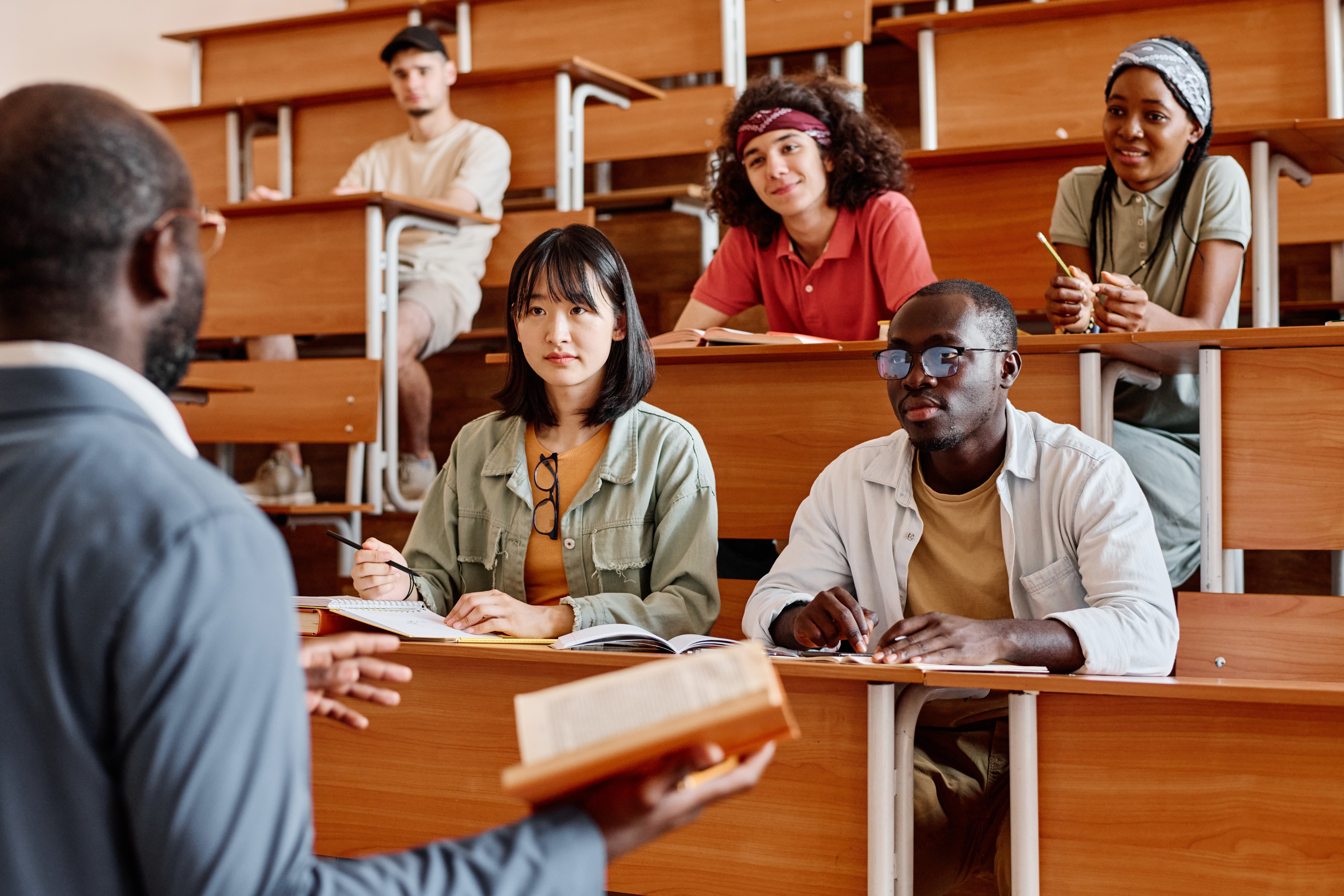 students-listening-to-teacher-at-lecture-2023-11-27-05-05-02-utc